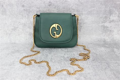 sac vintage gucci 1973|Gucci 1973 Small Crossbody Bag Green at Jill's .